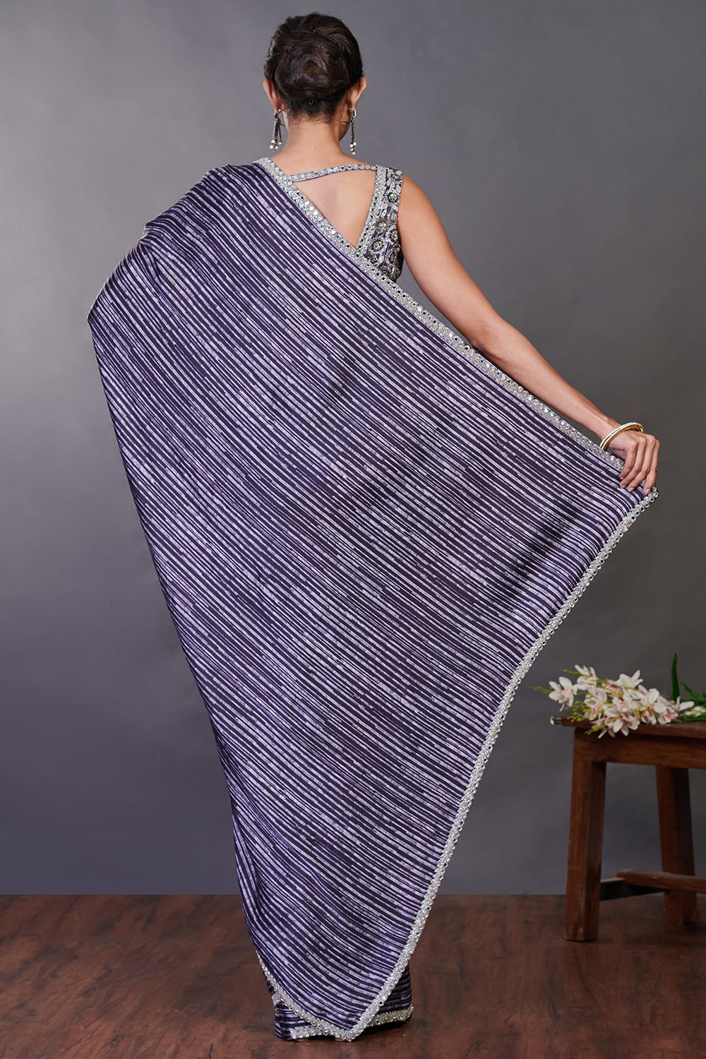 Shop deep purple satin printed sequin work sari online in USA with belt. Make a fashion statement on festive occasions and weddings with designer sarees, designer suits, Indian dresses, Anarkali suits, palazzo suits, designer gowns, sharara suits, embroidered sarees from Pure Elegance Indian fashion store in USA.-back
