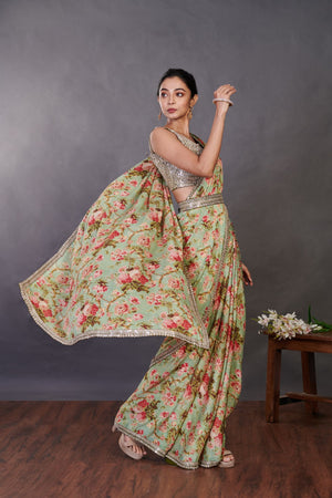 Buy pista green floral chikan sari online in USA with blouse and belt. Make a fashion statement on festive occasions and weddings with designer sarees, designer suits, Indian dresses, Anarkali suits, palazzo suits, designer gowns, sharara suits, embroidered sarees from Pure Elegance Indian fashion store in USA.-pallu