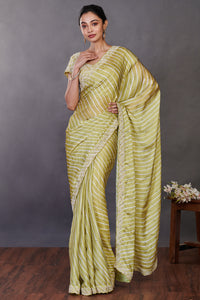 Buy beautiful pista green printed satin sari online in USA with bead work. Make a fashion statement on festive occasions and weddings with designer sarees, designer suits, Indian dresses, Anarkali suits, palazzo suits, designer gowns, sharara suits, embroidered sarees from Pure Elegance Indian fashion store in USA.-full view