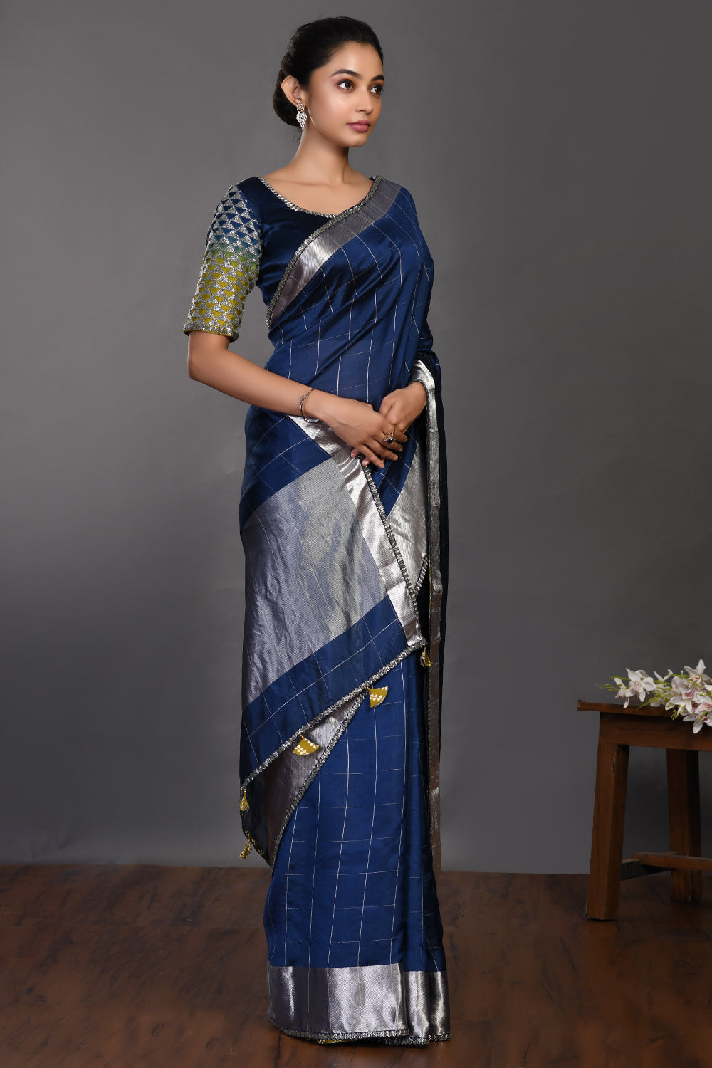 Buy beautiful navy blue handloom sari online in USA with silver zari border. Make a fashion statement on festive occasions and weddings with designer sarees, designer suits, Indian dresses, Anarkali suits, palazzo suits, designer gowns, sharara suits, embroidered sarees from Pure Elegance Indian fashion store in USA.-right