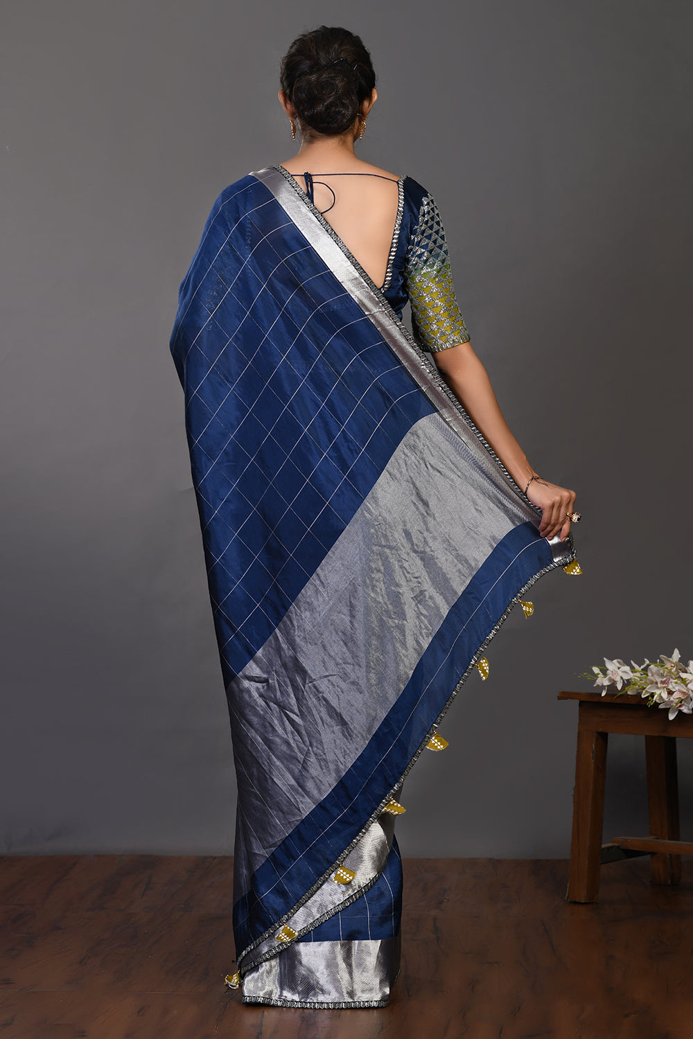 Buy beautiful navy blue handloom sari online in USA with silver zari border. Make a fashion statement on festive occasions and weddings with designer sarees, designer suits, Indian dresses, Anarkali suits, palazzo suits, designer gowns, sharara suits, embroidered sarees from Pure Elegance Indian fashion store in USA.-back