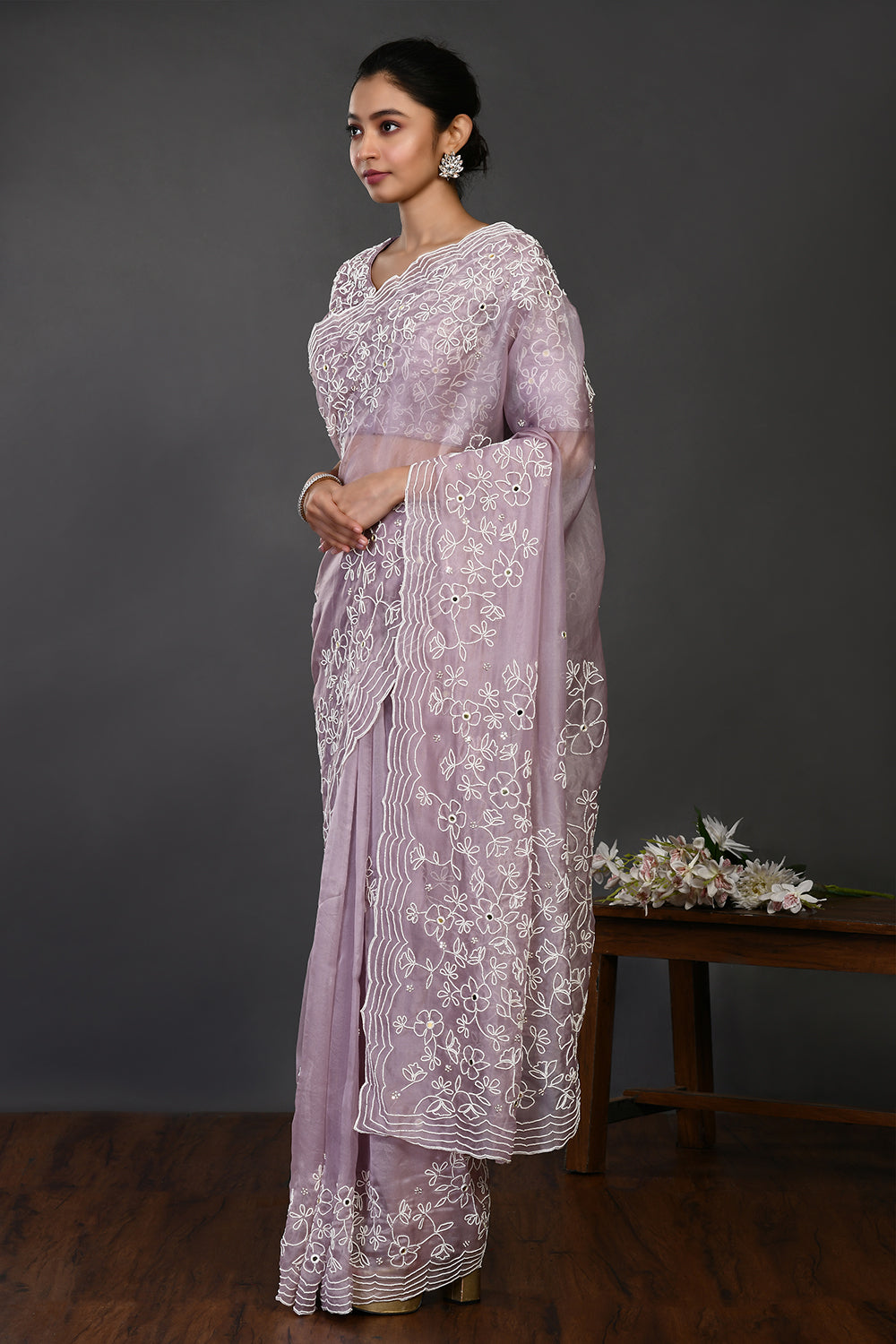 Buy stunning mauve pearl and mirror work organza sari online in USA. Make a fashion statement on festive occasions and weddings with designer sarees, designer suits, Indian dresses, Anarkali suits, palazzo suits, designer gowns, sharara suits, embroidered sarees from Pure Elegance Indian fashion store in USA.-side