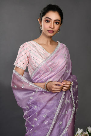 Shop beautiful lavender stone and zari work organza sari online in USA. Make a fashion statement on festive occasions and weddings with designer sarees, designer suits, Indian dresses, Anarkali suits, palazzo suits, designer gowns, sharara suits, embroidered sarees from Pure Elegance Indian fashion store in USA.-closeup