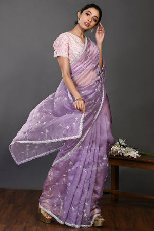 Shop beautiful lavender stone and zari work organza sari online in USA. Make a fashion statement on festive occasions and weddings with designer sarees, designer suits, Indian dresses, Anarkali suits, palazzo suits, designer gowns, sharara suits, embroidered sarees from Pure Elegance Indian fashion store in USA.-right
