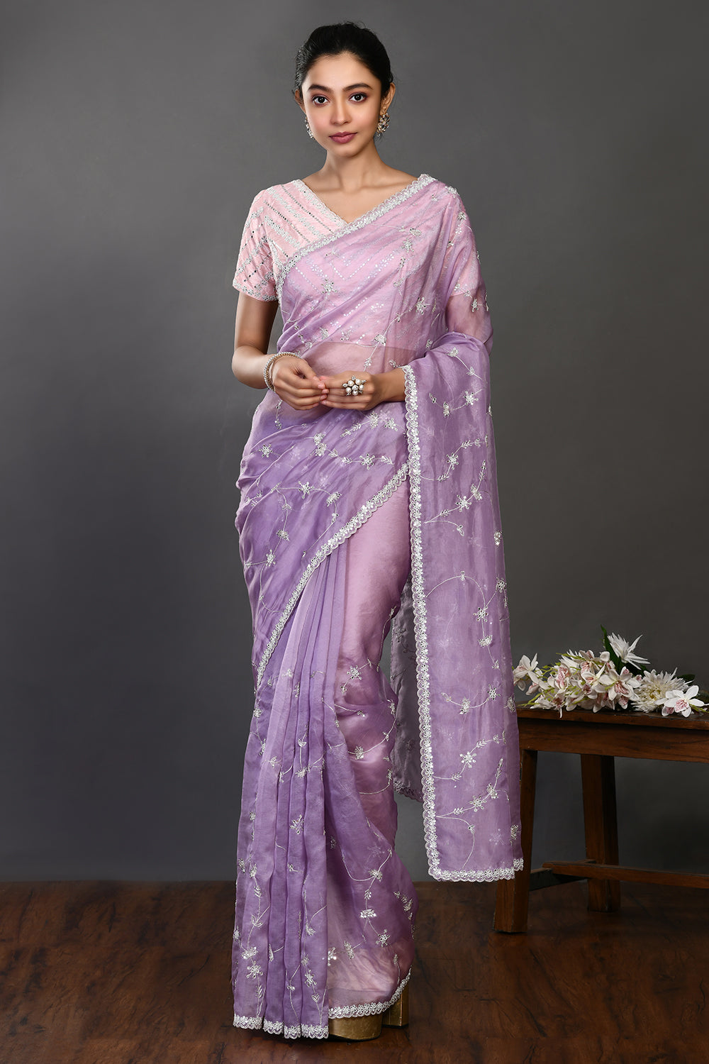 Shop beautiful lavender stone and zari work organza sari online in USA. Make a fashion statement on festive occasions and weddings with designer sarees, designer suits, Indian dresses, Anarkali suits, palazzo suits, designer gowns, sharara suits, embroidered sarees from Pure Elegance Indian fashion store in USA.-full view