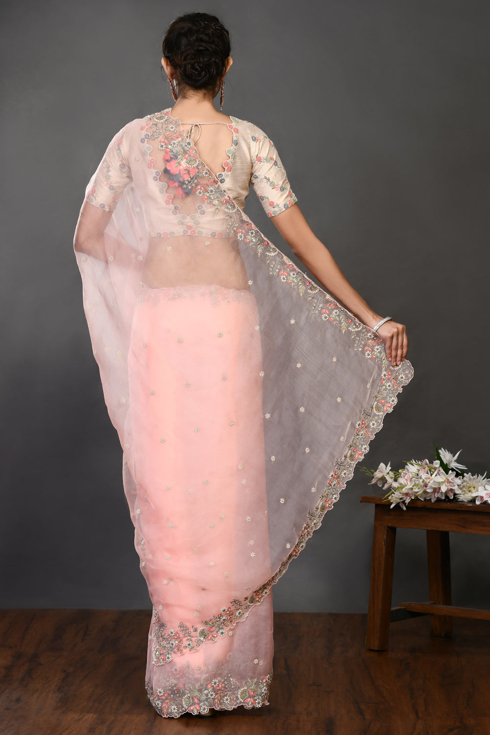 Buy stunning peach pearl and resham work organza sari online in USA. Make a fashion statement on festive occasions and weddings with designer sarees, designer suits, Indian dresses, Anarkali suits, palazzo suits, designer gowns, sharara suits, embroidered sarees from Pure Elegance Indian fashion store in USA.-back