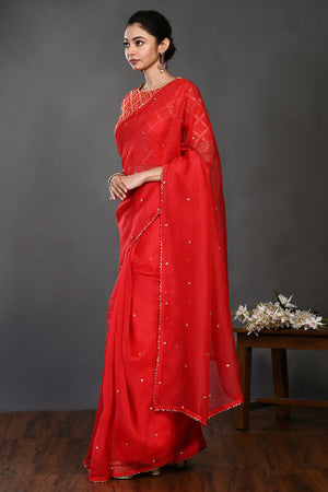 Buy red embroidered organza sari online in USA with Banarasi blouse. Make a fashion statement on festive occasions and weddings with designer sarees, designer suits, Indian dresses, Anarkali suits, palazzo suits, designer gowns, sharara suits, embroidered sarees from Pure Elegance Indian fashion store in USA.-pallu