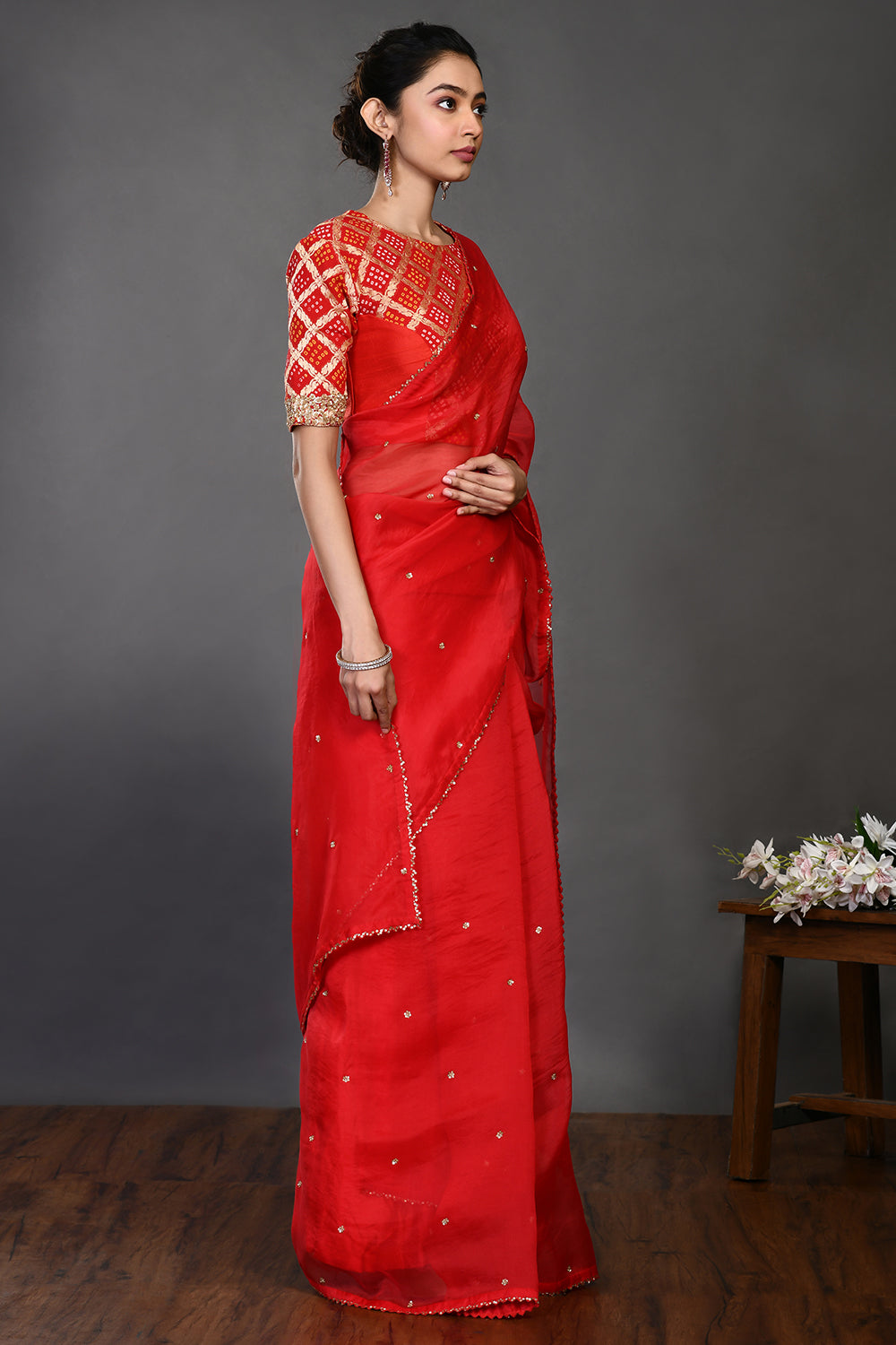 Buy red embroidered organza sari online in USA with Banarasi blouse. Make a fashion statement on festive occasions and weddings with designer sarees, designer suits, Indian dresses, Anarkali suits, palazzo suits, designer gowns, sharara suits, embroidered sarees from Pure Elegance Indian fashion store in USA.-right