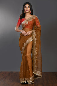 Buy brown tikki work organza sari online in USA with kiran lace and blouse. Make a fashion statement on festive occasions and weddings with designer sarees, designer suits, Indian dresses, Anarkali suits, palazzo suits, designer gowns, sharara suits, embroidered sarees from Pure Elegance Indian fashion store in USA.-full view