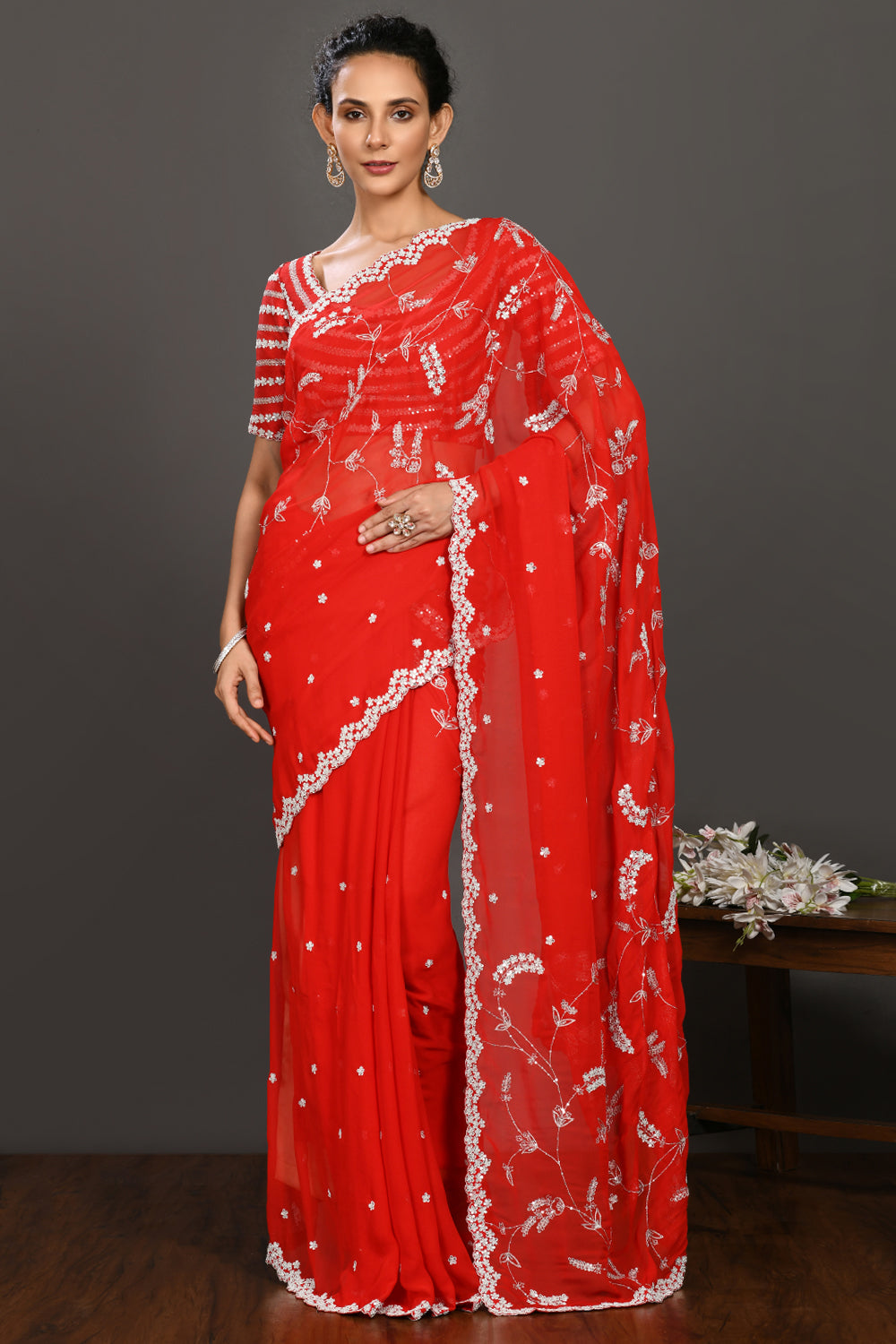 Shop red embroidered georgette sari online in USA with blouse. Make a fashion statement on festive occasions and weddings with designer sarees, designer suits, Indian dresses, Anarkali suits, palazzo suits, designer gowns, sharara suits, embroidered sarees from Pure Elegance Indian fashion store in USA.-full view