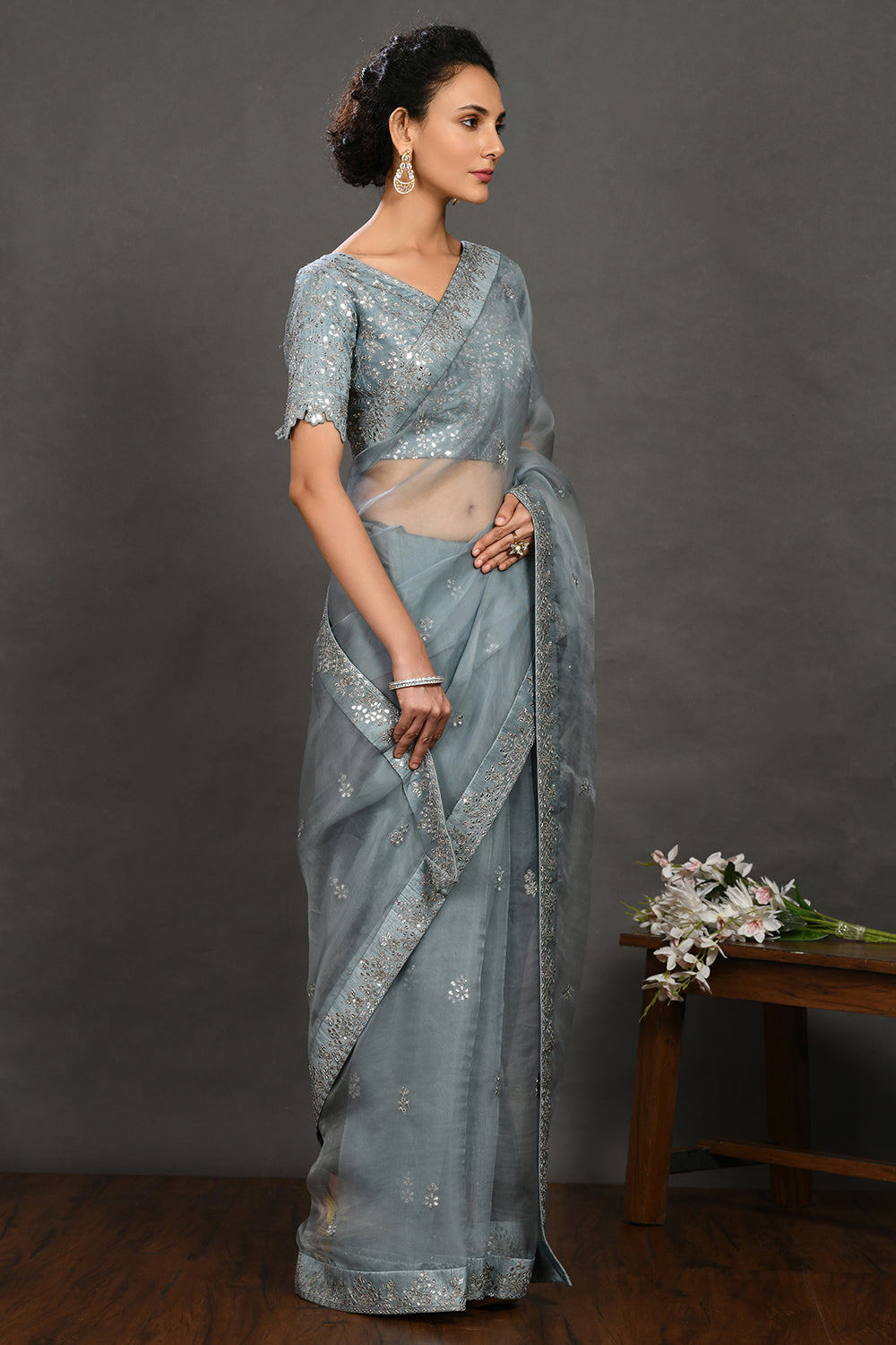 Shop teal blue embroidered organza sari online in USA with blouse. Make a fashion statement on festive occasions and weddings with designer sarees, designer suits, Indian dresses, Anarkali suits, palazzo suits, designer gowns, sharara suits, embroidered sarees from Pure Elegance Indian fashion store in USA.-right