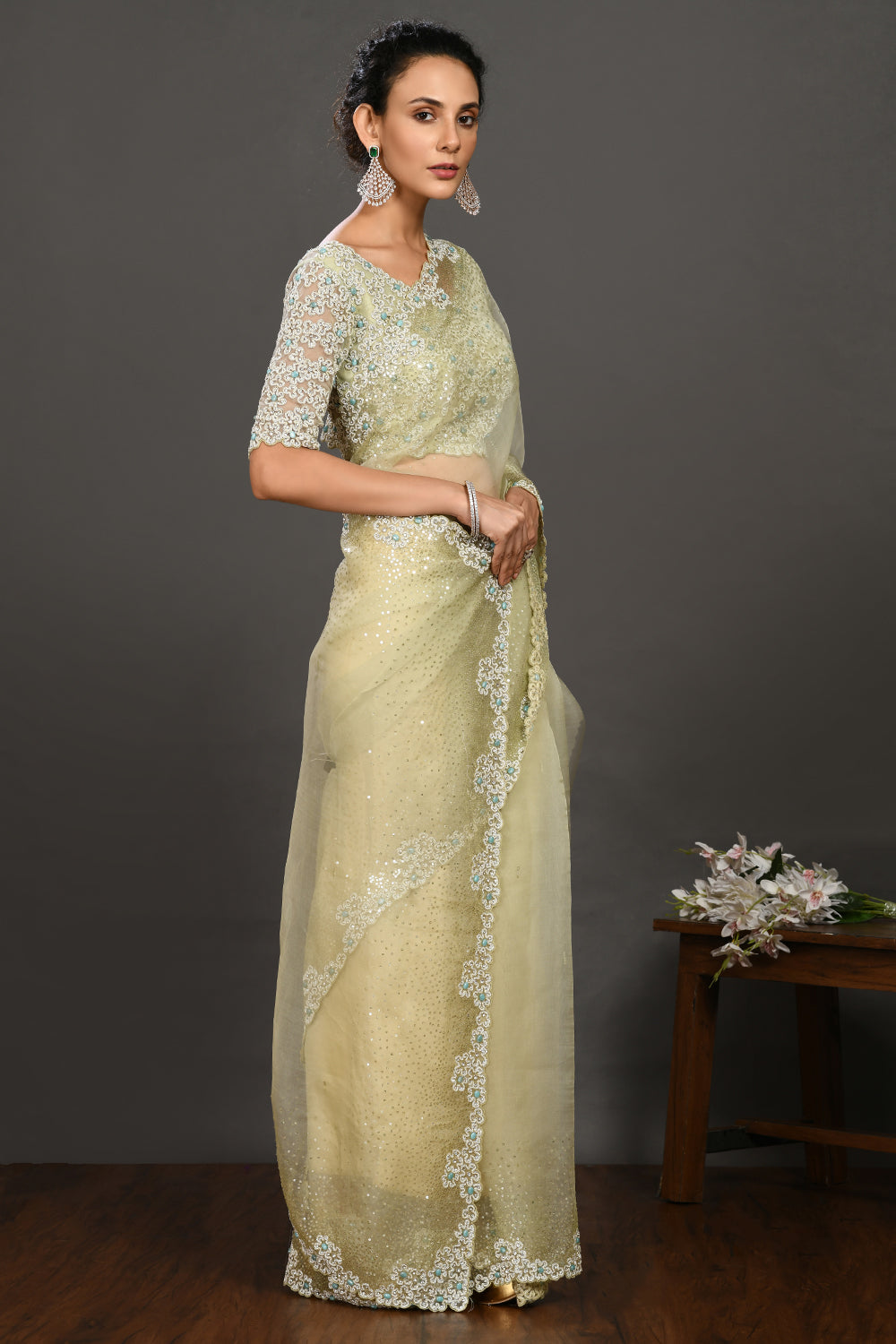 Buy pista green pearl and mirror work organza sari online in USA with blouse. Make a fashion statement on festive occasions and weddings with designer sarees, designer suits, Indian dresses, Anarkali suits, palazzo suits, designer gowns, sharara suits, embroidered sarees from Pure Elegance Indian fashion store in USA.-side