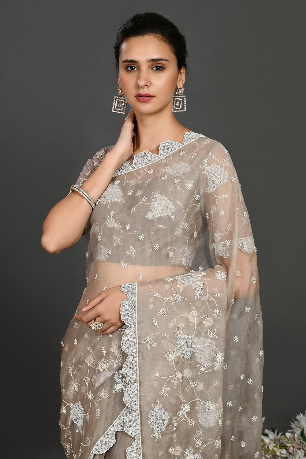 Buy grey stone and pearl work organza sari online in USA with blouse. Make a fashion statement on festive occasions and weddings with designer sarees, designer suits, Indian dresses, Anarkali suits, palazzo suits, designer gowns, sharara suits, embroidered sarees from Pure Elegance Indian fashion store in USA.-closeup
