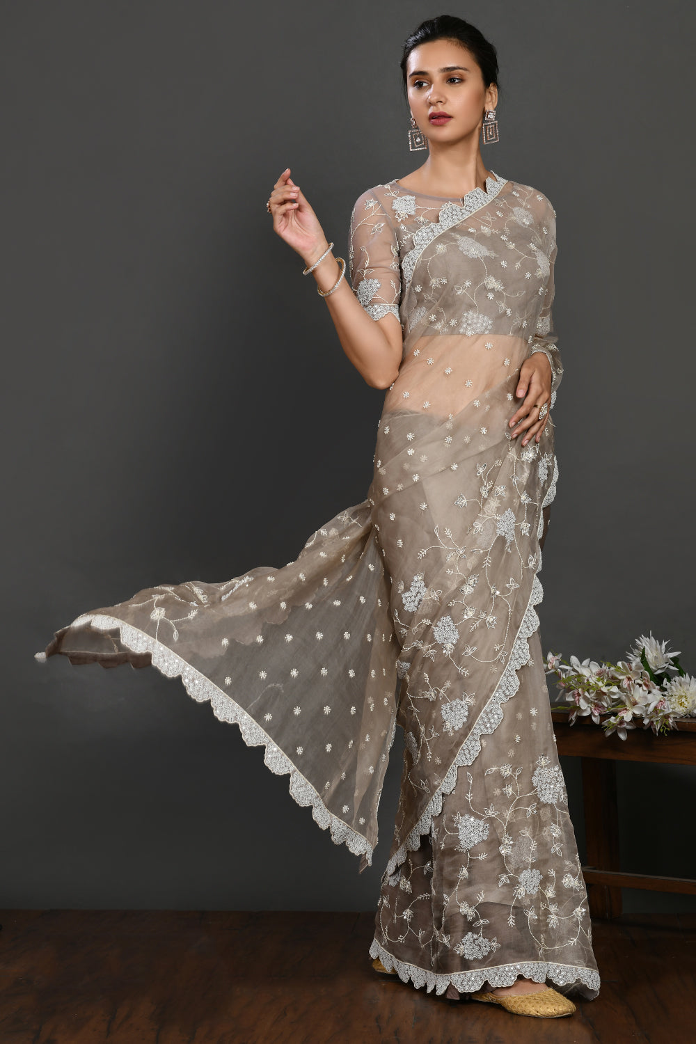 Buy grey stone and pearl work organza sari online in USA with blouse. Make a fashion statement on festive occasions and weddings with designer sarees, designer suits, Indian dresses, Anarkali suits, palazzo suits, designer gowns, sharara suits, embroidered sarees from Pure Elegance Indian fashion store in USA.-right