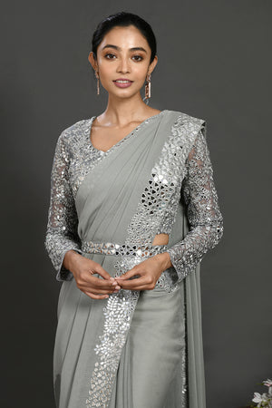 Buy grey mirror and resham work georgette belted sari online in USA. Make a fashion statement on festive occasions and weddings with designer sarees, designer suits, Indian dresses, Anarkali suits, palazzo suits, designer gowns, sharara suits, embroidered sarees from Pure Elegance Indian fashion store in USA.-closeup