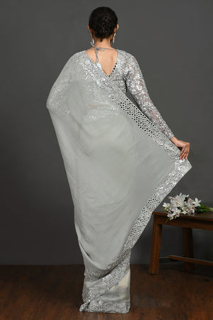 Buy grey mirror and resham work georgette belted sari online in USA. Make a fashion statement on festive occasions and weddings with designer sarees, designer suits, Indian dresses, Anarkali suits, palazzo suits, designer gowns, sharara suits, embroidered sarees from Pure Elegance Indian fashion store in USA.-back