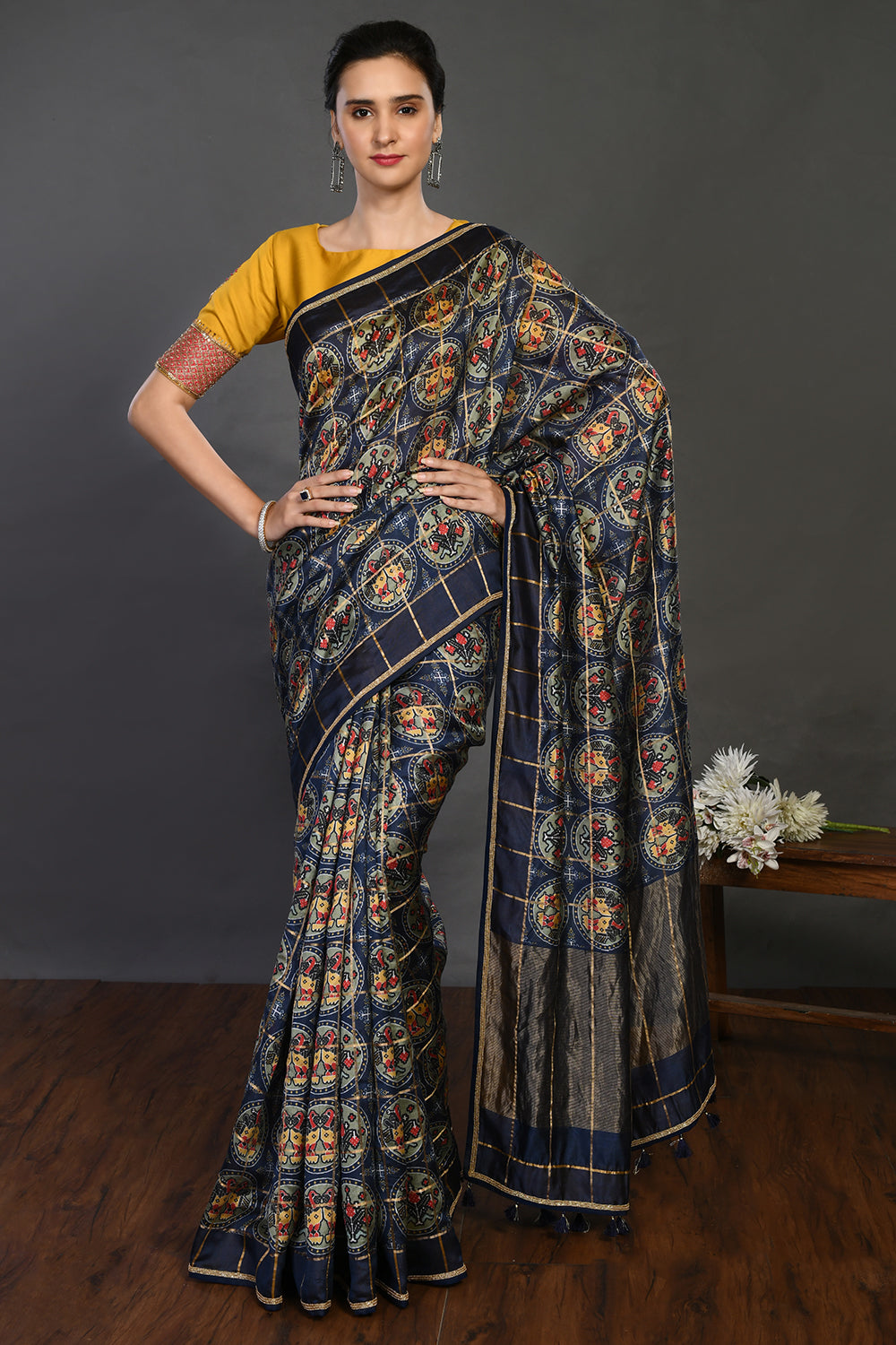 Buy navy blue printed handloom sari online in USA with yellow blouse. Make a fashion statement on festive occasions and weddings with designer sarees, designer suits, Indian dresses, Anarkali suits, palazzo suits, designer gowns, sharara suits, embroidered sarees from Pure Elegance Indian fashion store in USA.-full view