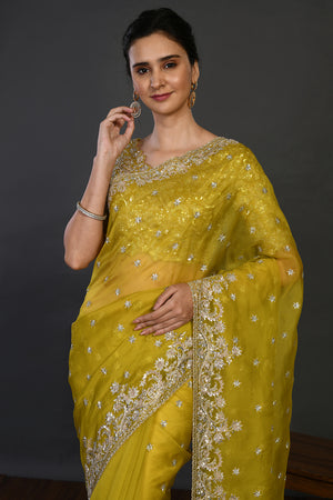 Buy mustard mirror and cutdana work organza sari online in USA with blouse. Make a fashion statement on festive occasions and weddings with designer sarees, designer suits, Indian dresses, Anarkali suits, palazzo suits, designer gowns, sharara suits, embroidered sarees from Pure Elegance Indian fashion store in USA.-closeup