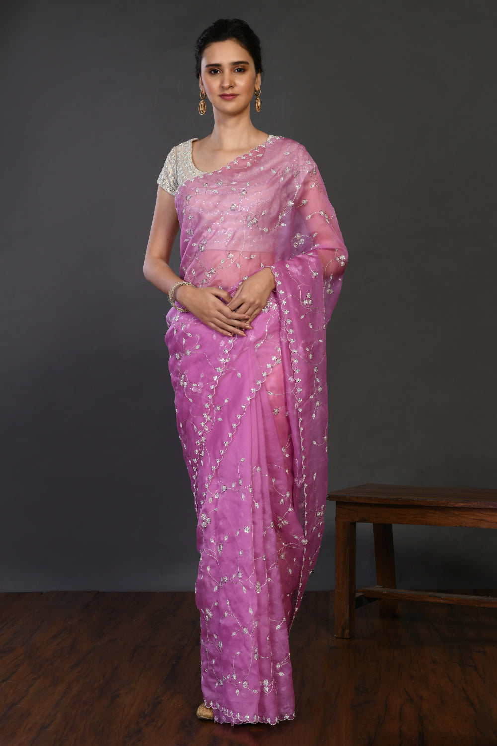 Buy onion pink embroidered organza sari online in USA with blouse. Make a fashion statement on festive occasions and weddings with designer sarees, designer suits, Indian dresses, Anarkali suits, palazzo suits, designer gowns, sharara suits, embroidered sarees from Pure Elegance Indian fashion store in USA.-full view