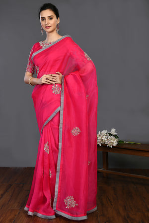 Buy rani pink bulian zari and sequin work organza sari online in USA. Make a fashion statement on festive occasions and weddings with designer sarees, designer suits, Indian dresses, Anarkali suits, palazzo suits, designer gowns, sharara suits, embroidered sarees from Pure Elegance Indian fashion store in USA.-pallu