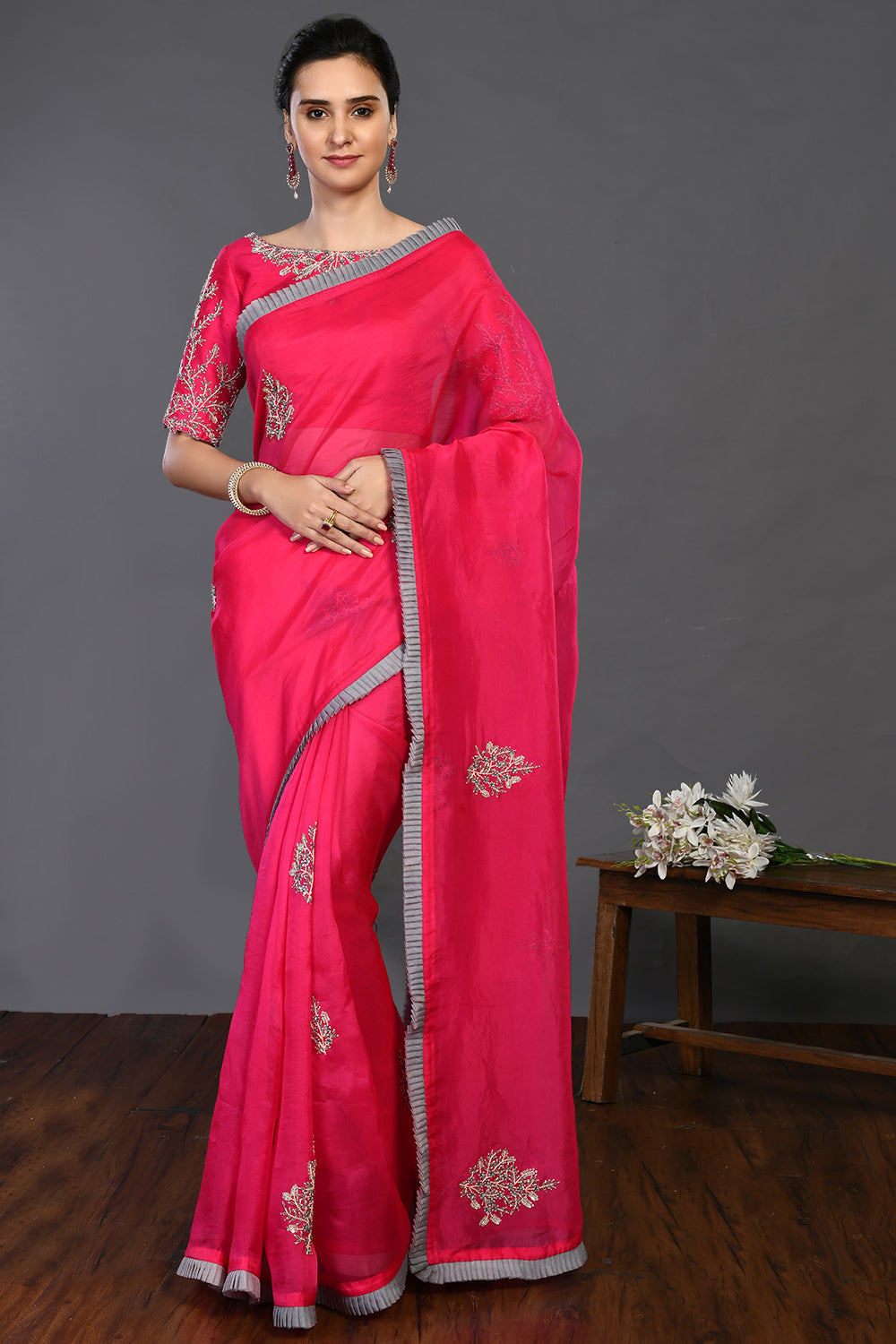 Buy rani pink bulian zari and sequin work organza sari online in USA. Make a fashion statement on festive occasions and weddings with designer sarees, designer suits, Indian dresses, Anarkali suits, palazzo suits, designer gowns, sharara suits, embroidered sarees from Pure Elegance Indian fashion store in USA.-full view
