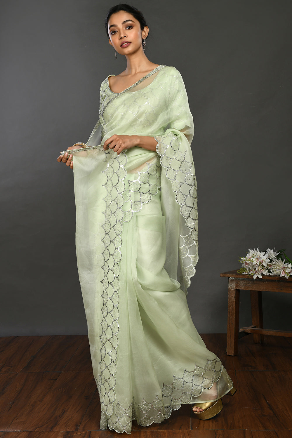 Buy beautiful pista green stone and sequin work organza sari online in USA. Make a fashion statement on festive occasions and weddings with designer sarees, designer suits, Indian dresses, Anarkali suits, palazzo suits, designer gowns, sharara suits, embroidered sarees from Pure Elegance Indian fashion store in USA.-saree