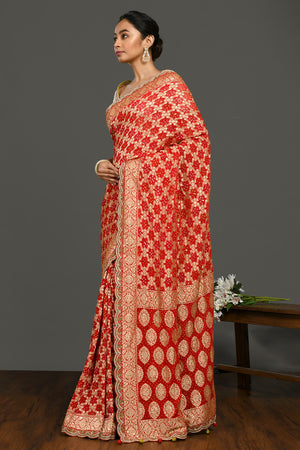 Buy red bandhej pearl work sari online in USA with cream blouse. Make a fashion statement on festive occasions and weddings with designer sarees, designer suits, Indian dresses, Anarkali suits, palazzo suits, designer gowns, sharara suits, embroidered sarees from Pure Elegance Indian fashion store in USA.-pallu