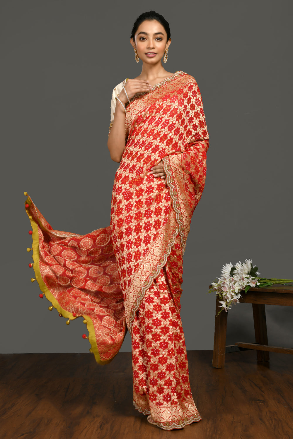 Buy red bandhej pearl work sari online in USA with cream blouse. Make a fashion statement on festive occasions and weddings with designer sarees, designer suits, Indian dresses, Anarkali suits, palazzo suits, designer gowns, sharara suits, embroidered sarees from Pure Elegance Indian fashion store in USA.-full view