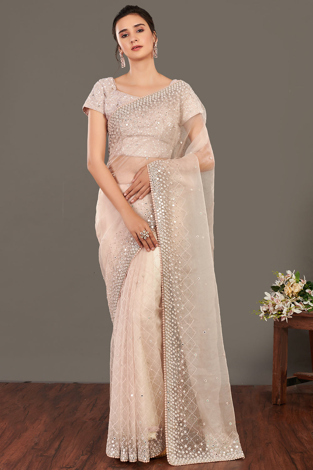 Shop beige mirror work organza sari online in USA with blouse. Make a fashion statement on festive occasions and weddings with designer sarees, designer suits, Indian dresses, Anarkali suits, palazzo suits, designer gowns, sharara suits, embroidered sarees from Pure Elegance Indian fashion store in USA.-full view
