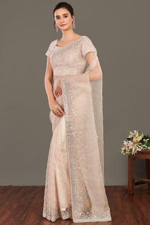 Shop beige mirror work organza sari online in USA with blouse. Make a fashion statement on festive occasions and weddings with designer sarees, designer suits, Indian dresses, Anarkali suits, palazzo suits, designer gowns, sharara suits, embroidered sarees from Pure Elegance Indian fashion store in USA.-side