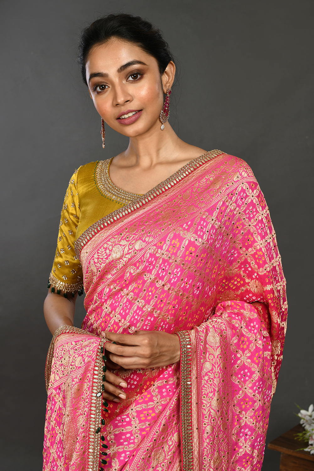 Buy fuschia pink gota and stone work bandhej sari online in USA with blouse. Make a fashion statement on festive occasions and weddings with designer sarees, designer suits, Indian dresses, Anarkali suits, palazzo suits, designer gowns, sharara suits, embroidered sarees from Pure Elegance Indian fashion store in USA.-closeup