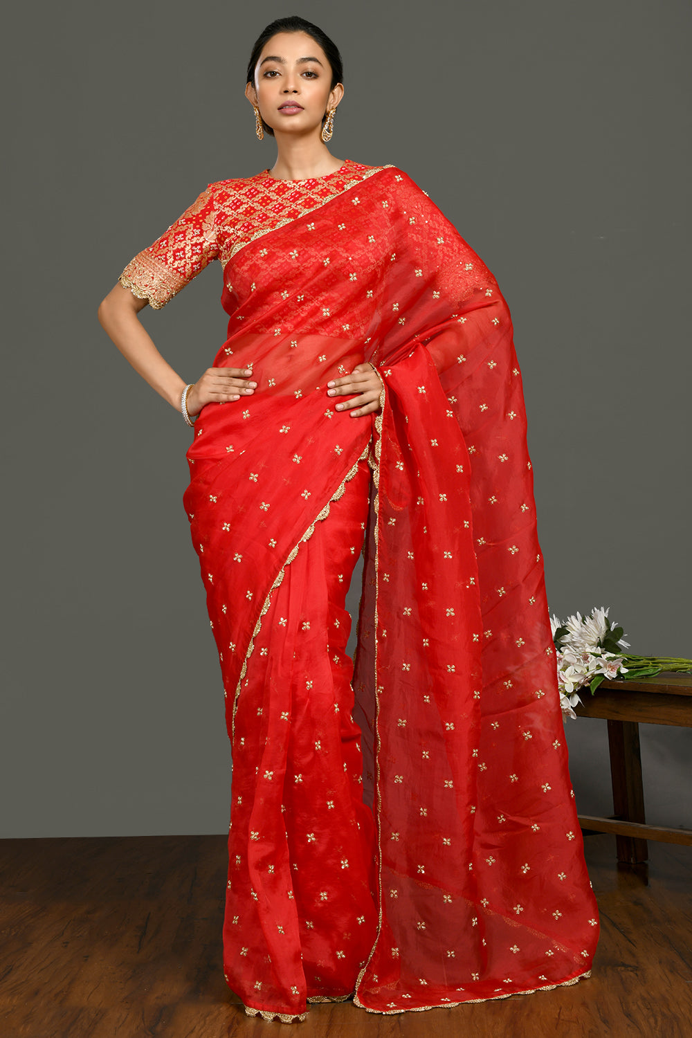 Shop red sequin and zari organza sari online in USA with blouse. Make a fashion statement on festive occasions and weddings with designer sarees, designer suits, Indian dresses, Anarkali suits, palazzo suits, designer gowns, sharara suits, embroidered sarees from Pure Elegance Indian fashion store in USA.-full view