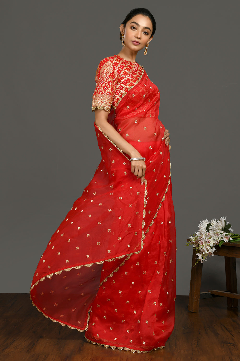 Shop red sequin and zari organza sari online in USA with blouse. Make a fashion statement on festive occasions and weddings with designer sarees, designer suits, Indian dresses, Anarkali suits, palazzo suits, designer gowns, sharara suits, embroidered sarees from Pure Elegance Indian fashion store in USA.-right