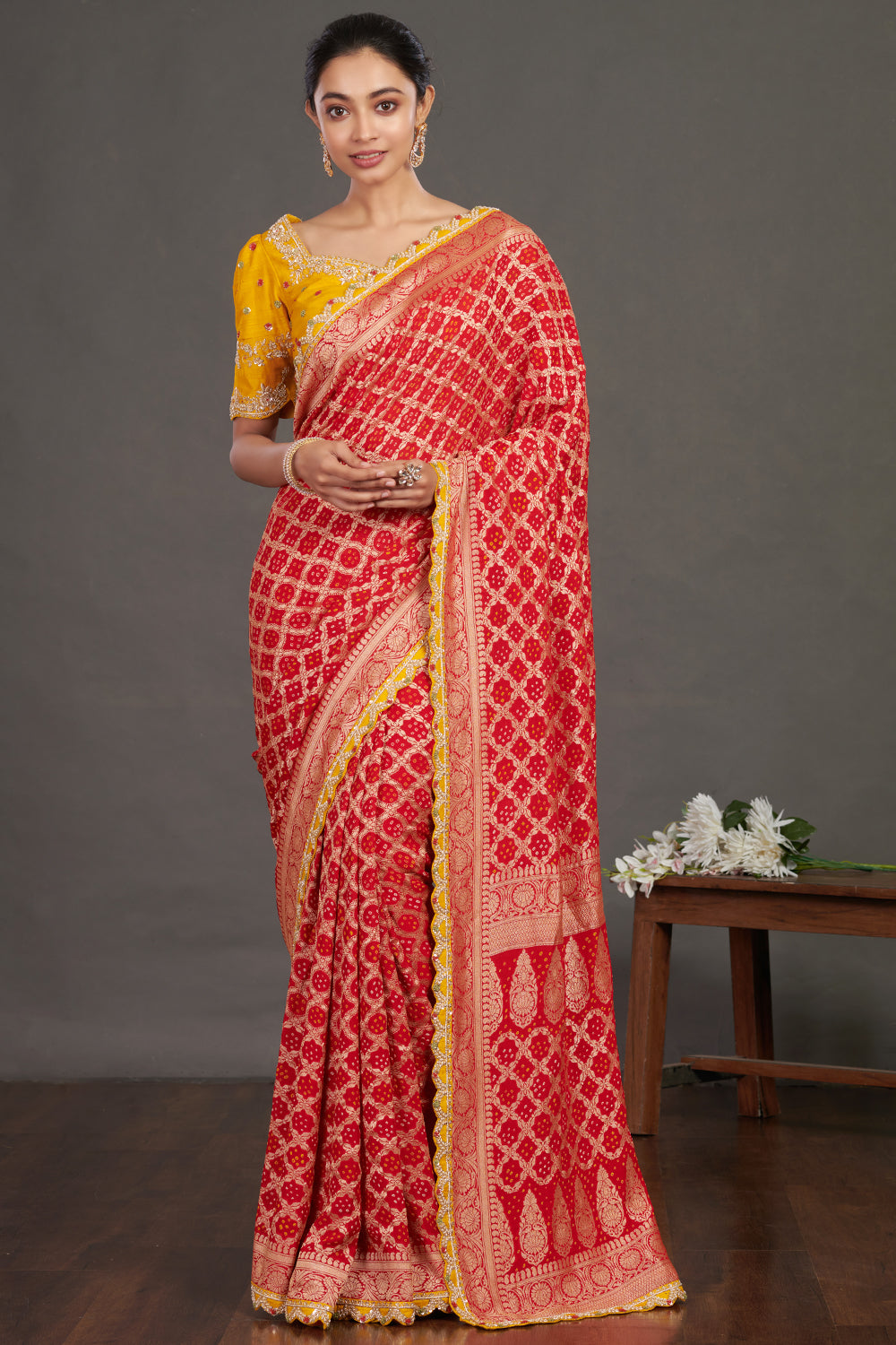 Buy red embroidered bandhej sari online in USA with yellow blouse. Make a fashion statement on festive occasions and weddings with designer sarees, designer suits, Indian dresses, Anarkali suits, palazzo suits, designer gowns, sharara suits, embroidered sarees from Pure Elegance Indian fashion store in USA.-full view
