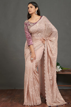 Buy dusty pink chikankari sari online in USA with velvet saree blouse. Make a fashion statement on festive occasions and weddings with designer sarees, designer suits, Indian dresses, Anarkali suits, palazzo suits, designer gowns, sharara suits, embroidered sarees from Pure Elegance Indian fashion store in USA.-front