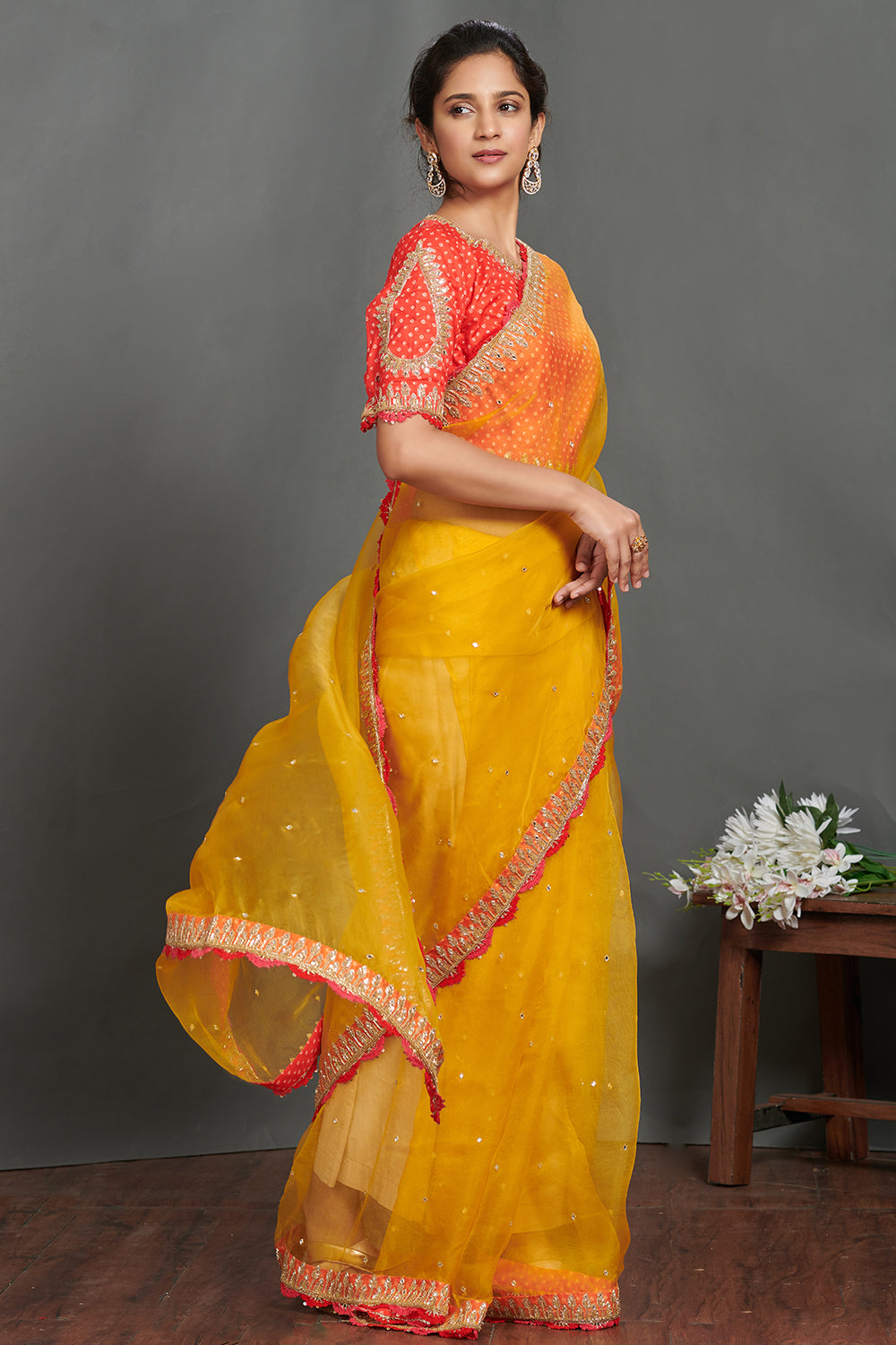 Shop mustard embroidered organza sari online in USA with orange blouse. Make a fashion statement on festive occasions and weddings with designer sarees, designer suits, Indian dresses, Anarkali suits, palazzo suits, designer gowns, sharara suits, embroidered sarees from Pure Elegance Indian fashion store in USA.-right