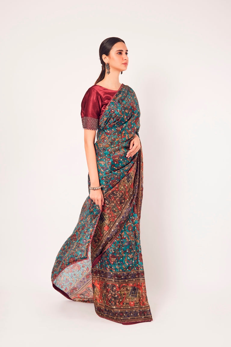 Buy stunning green printed muslin sari online in USA with blouse. Make a fashion statement on festive occasions and weddings with designer sarees, designer suits, Indian dresses, Anarkali suits, palazzo suits, designer gowns, sharara suits, embroidered sarees from Pure Elegance Indian fashion store in USA.-right