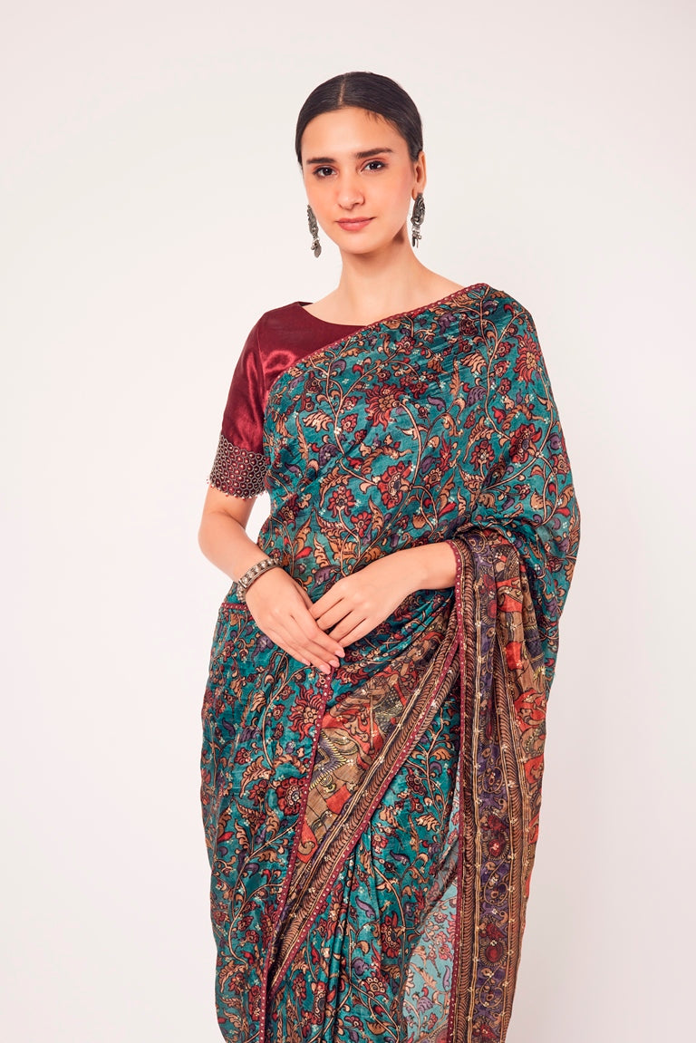 Buy stunning green printed muslin sari online in USA with blouse. Make a fashion statement on festive occasions and weddings with designer sarees, designer suits, Indian dresses, Anarkali suits, palazzo suits, designer gowns, sharara suits, embroidered sarees from Pure Elegance Indian fashion store in USA.-closeup