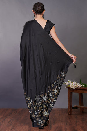 Shop black Swarovski floral motifs satin sari online in USA with blouse. Make a fashion statement on festive occasions and weddings with designer sarees, designer suits, Indian dresses, Anarkali suits, palazzo suits, designer gowns, sharara suits, embroidered sarees from Pure Elegance Indian fashion store in USA.-back