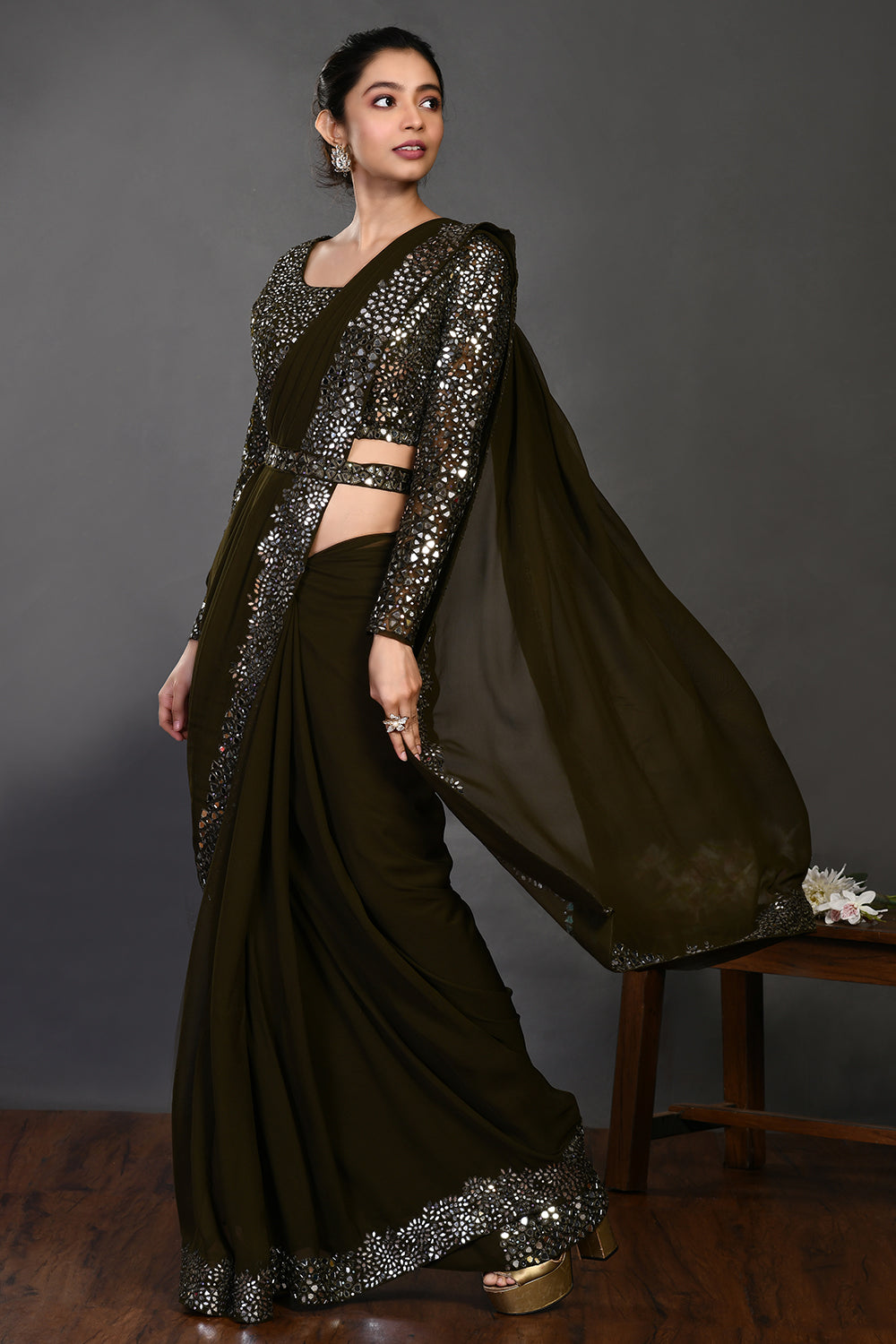 Buy mehendi green mirror work belted georgette sari online in USA with blouse. Make a fashion statement on festive occasions and weddings with designer sarees, designer suits, Indian dresses, Anarkali suits, palazzo suits, designer gowns, sharara suits, embroidered sarees from Pure Elegance Indian fashion store in USA.-pallu