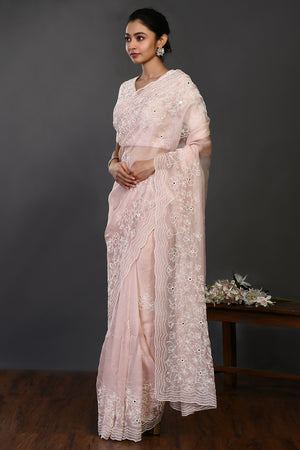 Shop pink pearl and mirror work organza sari online in USA with blouse. Make a fashion statement on festive occasions and weddings with designer sarees, designer suits, Indian dresses, Anarkali suits, palazzo suits, designer gowns, sharara suits, embroidered sarees from Pure Elegance Indian fashion store in USA.-side