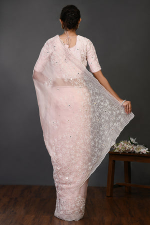 Shop pink pearl and mirror work organza sari online in USA with blouse. Make a fashion statement on festive occasions and weddings with designer sarees, designer suits, Indian dresses, Anarkali suits, palazzo suits, designer gowns, sharara suits, embroidered sarees from Pure Elegance Indian fashion store in USA.-back