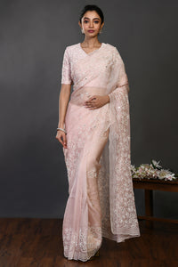 Shop pink pearl and mirror work organza sari online in USA with blouse. Make a fashion statement on festive occasions and weddings with designer sarees, designer suits, Indian dresses, Anarkali suits, palazzo suits, designer gowns, sharara suits, embroidered sarees from Pure Elegance Indian fashion store in USA.-full view
