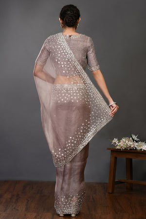 Shop beige embroidered designer organza sari online in USA with blouse. Make a fashion statement on festive occasions and weddings with designer sarees, designer suits, Indian dresses, Anarkali suits, palazzo suits, designer gowns, sharara suits, embroidered sarees from Pure Elegance Indian fashion store in USA.-back