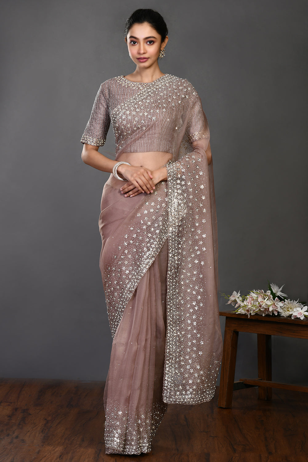 Shop beige embroidered designer organza sari online in USA with blouse. Make a fashion statement on festive occasions and weddings with designer sarees, designer suits, Indian dresses, Anarkali suits, palazzo suits, designer gowns, sharara suits, embroidered sarees from Pure Elegance Indian fashion store in USA.-full view