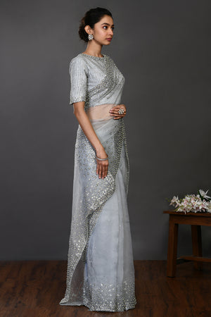 Buy doctor blue embroidered designer organza sari online in USA with blouse. Make a fashion statement on festive occasions and weddings with designer sarees, designer suits, Indian dresses, Anarkali suits, palazzo suits, designer gowns, sharara suits, embroidered sarees from Pure Elegance Indian fashion store in USA.-side