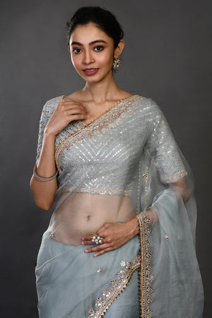 Buy doctor blue mirror and zari work organza sari online in USA with blouse. Make a fashion statement on festive occasions and weddings with designer sarees, designer suits, Indian dresses, Anarkali suits, palazzo suits, designer gowns, sharara suits, embroidered sarees from Pure Elegance Indian fashion store in USA.-closeup