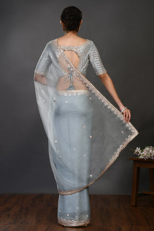 Buy doctor blue mirror and zari work organza sari online in USA with blouse. Make a fashion statement on festive occasions and weddings with designer sarees, designer suits, Indian dresses, Anarkali suits, palazzo suits, designer gowns, sharara suits, embroidered sarees from Pure Elegance Indian fashion store in USA.-back