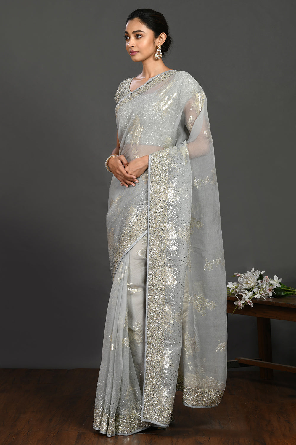 Shop doctor blue cutdana and stone work organza sari online in USA with blouse. Make a fashion statement on festive occasions and weddings with designer sarees, designer suits, Indian dresses, Anarkali suits, palazzo suits, designer gowns, sharara suits, embroidered sarees from Pure Elegance Indian fashion store in USA.-pallu
