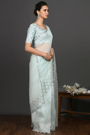 Shop aqua blue stone and sequin work organza sari online in USA. Make a fashion statement on festive occasions and weddings with designer sarees, designer suits, Indian dresses, Anarkali suits, palazzo suits, designer gowns, sharara suits, embroidered sarees from Pure Elegance Indian fashion store in USA.-right